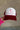 Front view of the Breast Cancer Gear: You Can Do It Trucker Hat that has a burgundy bill and back, a snapback, pink trim, and a cream front with an embroidered pink and burgundy graphic. 