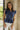 Bellamy Navy Peplum Ruffle Sleeveless Top- close up front view