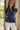 Bellamy Navy Peplum Ruffle Sleeveless Top- frontal side view