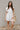 Brynlee White Smocked Waist Sleeveless Romper- front view