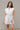 Brynlee White Smocked Waist Sleeveless Romper- frontal top view