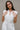 Brynlee White Smocked Waist Sleeveless Romper- close up top view