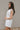 Brynlee White Smocked Waist Sleeveless Romper- side view