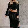 Full body front view of model wearing the Kylie Black & Taupe Mesh Midi Skirt that has black mesh fabric, taupe mesh lining, an elastic waist, a slit on the side, and lettuce hem details.