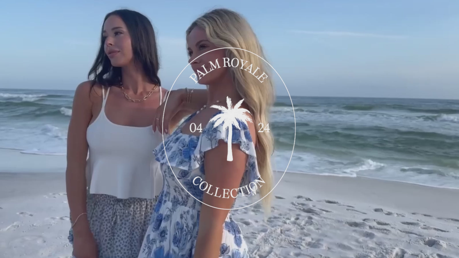 video of 2 girls in dresses on the beach by the ocean - palm royale collcetion shop now