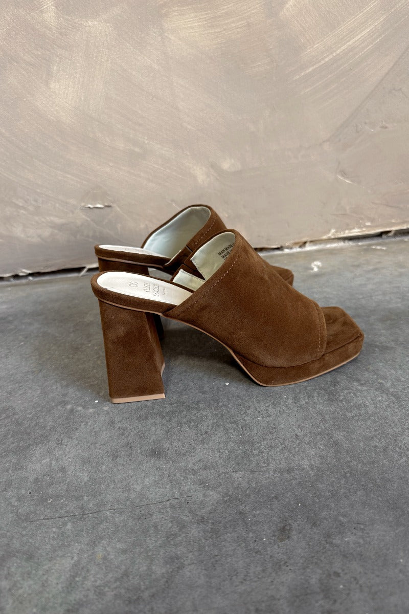 Side view of the Vivienne Brown Suede Slide Heel which features brown soft suede, platform sole, slide-on style and block heel.