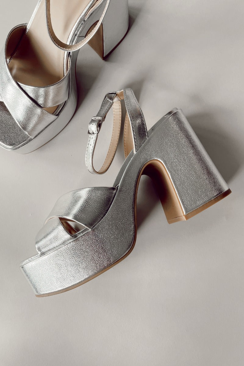 Sole view of Funkie Platform Heels features silver criss cross strap, platform sole, block heel and adjustable ankle straps.