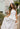 Chloe Ecru Pleated Flare Strapless Midi Dress - front view