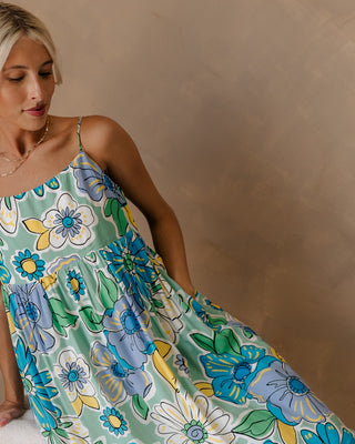 Woman wearing dress to feature 2024 travel dress trends. 