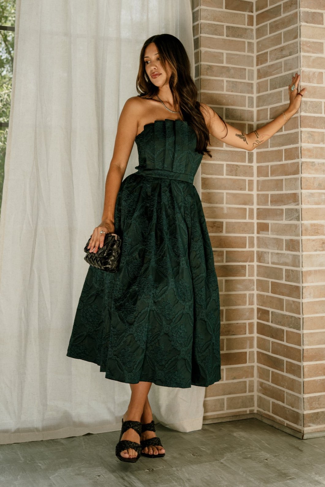 Lizard Thicket model wearing the Carmen Green Embroidered Midi Dress