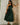 Lizard Thicket model wearing the Carmen Green Embroidered Midi Dress