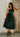 Lizard Thicket model wearing the Carmen Green Embroidered Midi Dress