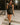 Brianna Black Faux Leather Tie Romper- full body right side view