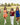 Image shows 5 models walking across football field, dressed in clothing from the Lizard Thicket Game Day Collection