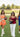 Image shows 5 models walking across football field, dressed in clothing from the Lizard Thicket Game Day Collection