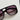 Kennedy Sunglasses in Black - flat lay - close up front view