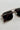 Regan Sunglasses in Gold & Black - flat lay - close up back view