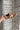 Margot Brown Low Profile Sneakers - held by model
