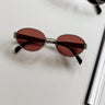 Clarissa Sunglasses in Silver & Pink - front view - flat -lay