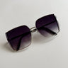 Serena Sunglasses in Silver & Black - flat lay - front view