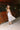 Ellie Cream Lace Midi Skirt - blonde model - full body back view