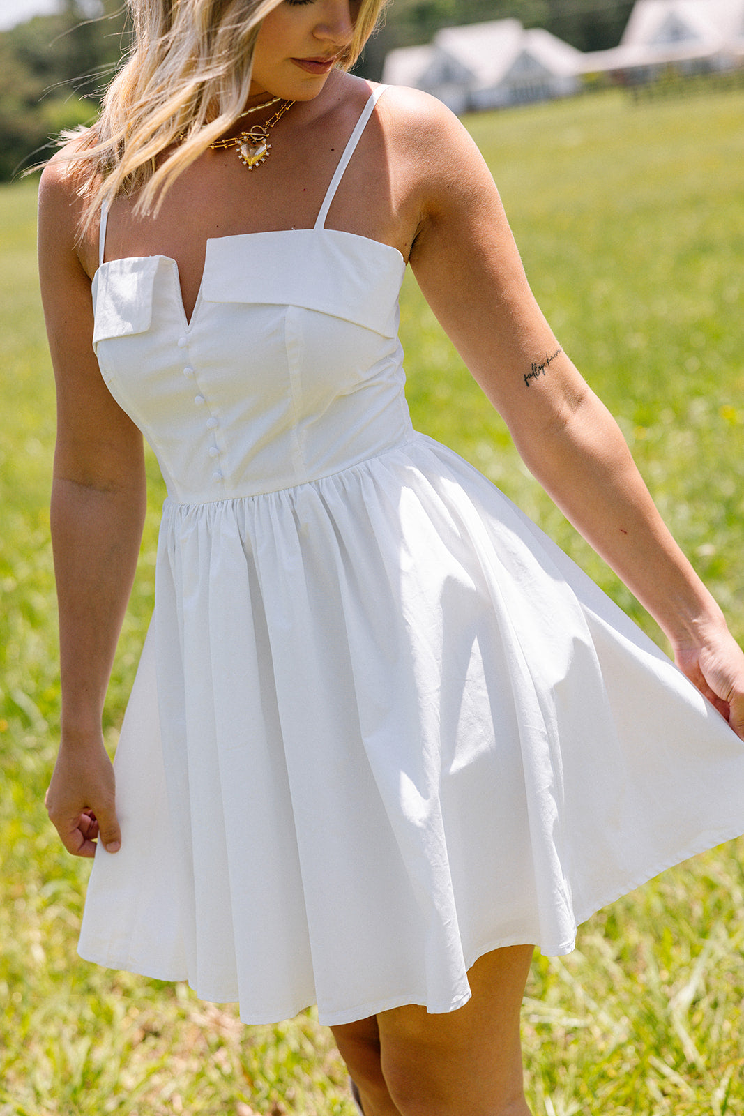 Janelle White Flare Mini Dress- frontal side view