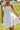 Janelle White Flare Mini Dress- frontal side view