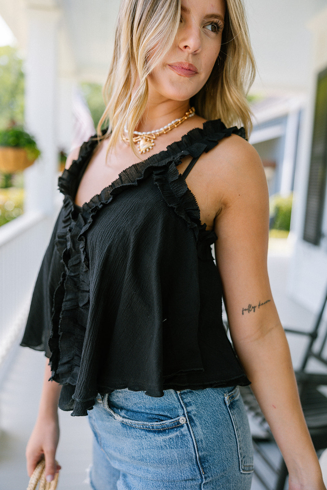 Willa Black Ruffle Sleeveless Tank- frontal side view