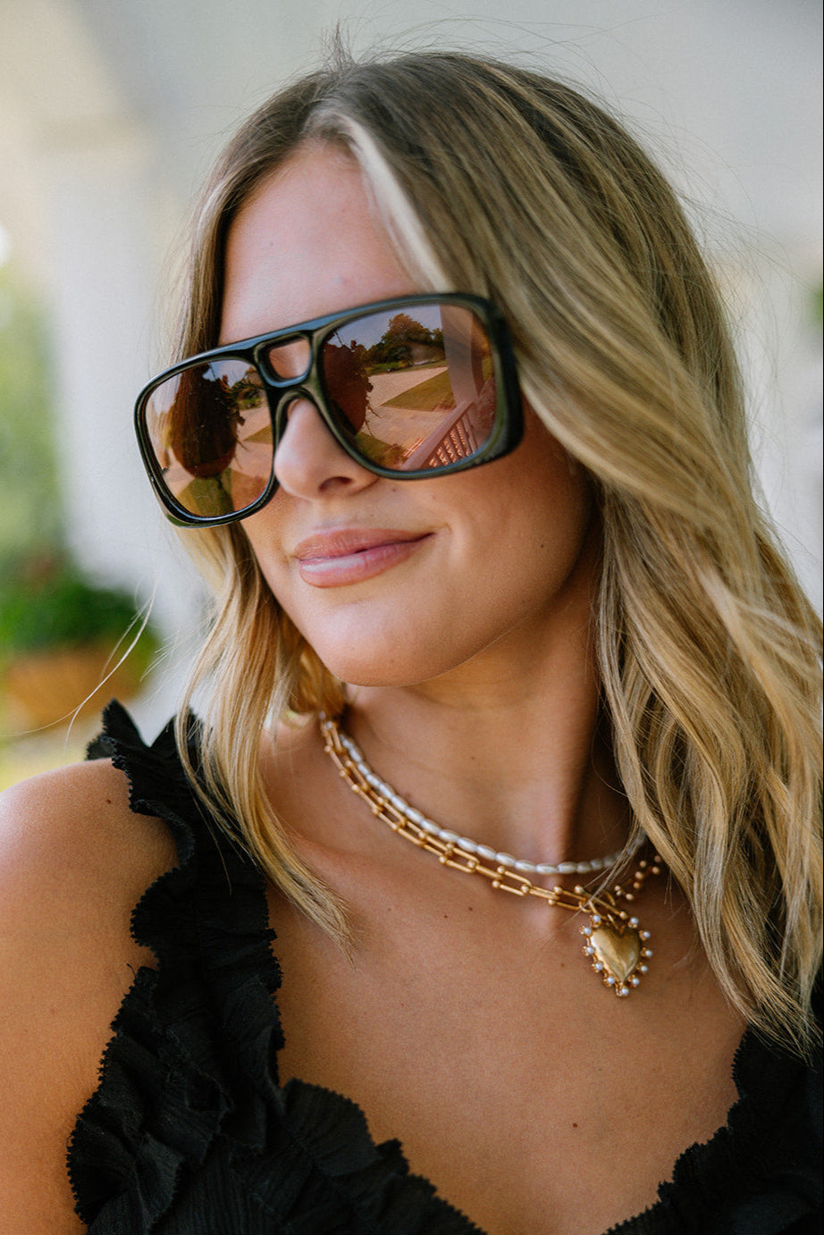 Kennedy Sunglasses in Black & Brown - front view on model