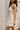 Nyla Beige & Brown Flare Mini Dress- close up side view
