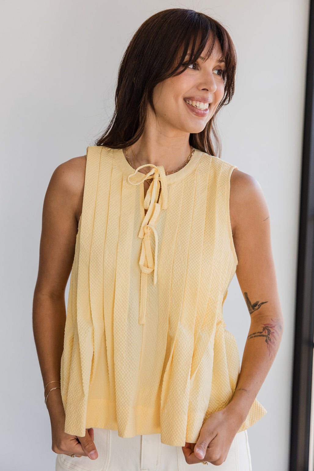 Arianna Yellow Pleated Flare Sleeveless Top- top view