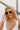 Clarissa Sunglasses in Gold & Black - front view on model