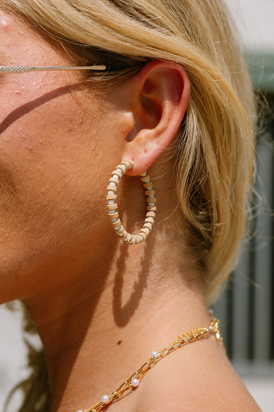 Bethany Wooden & Cream Beaded Hoop Earrings - close side view on model