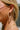 Bethany Wooden & Cream Beaded Hoop Earrings - close side view on model