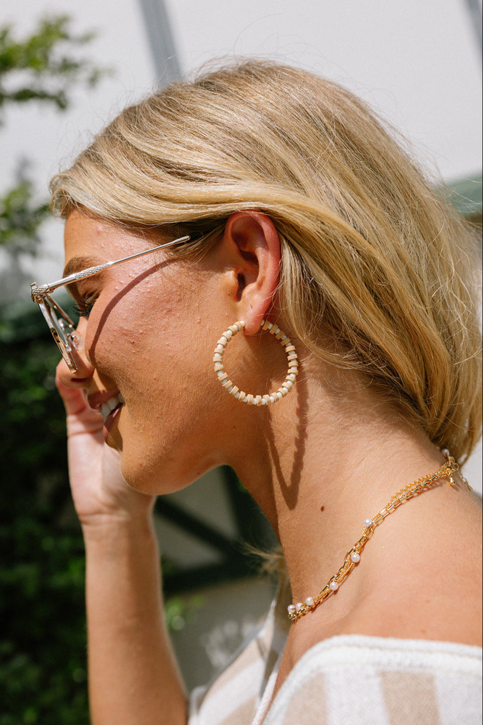 Bethany Wooden & Cream Beaded Hoop Earrings - side view on model