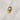 Topaz rhinestone gold charm against a white background.