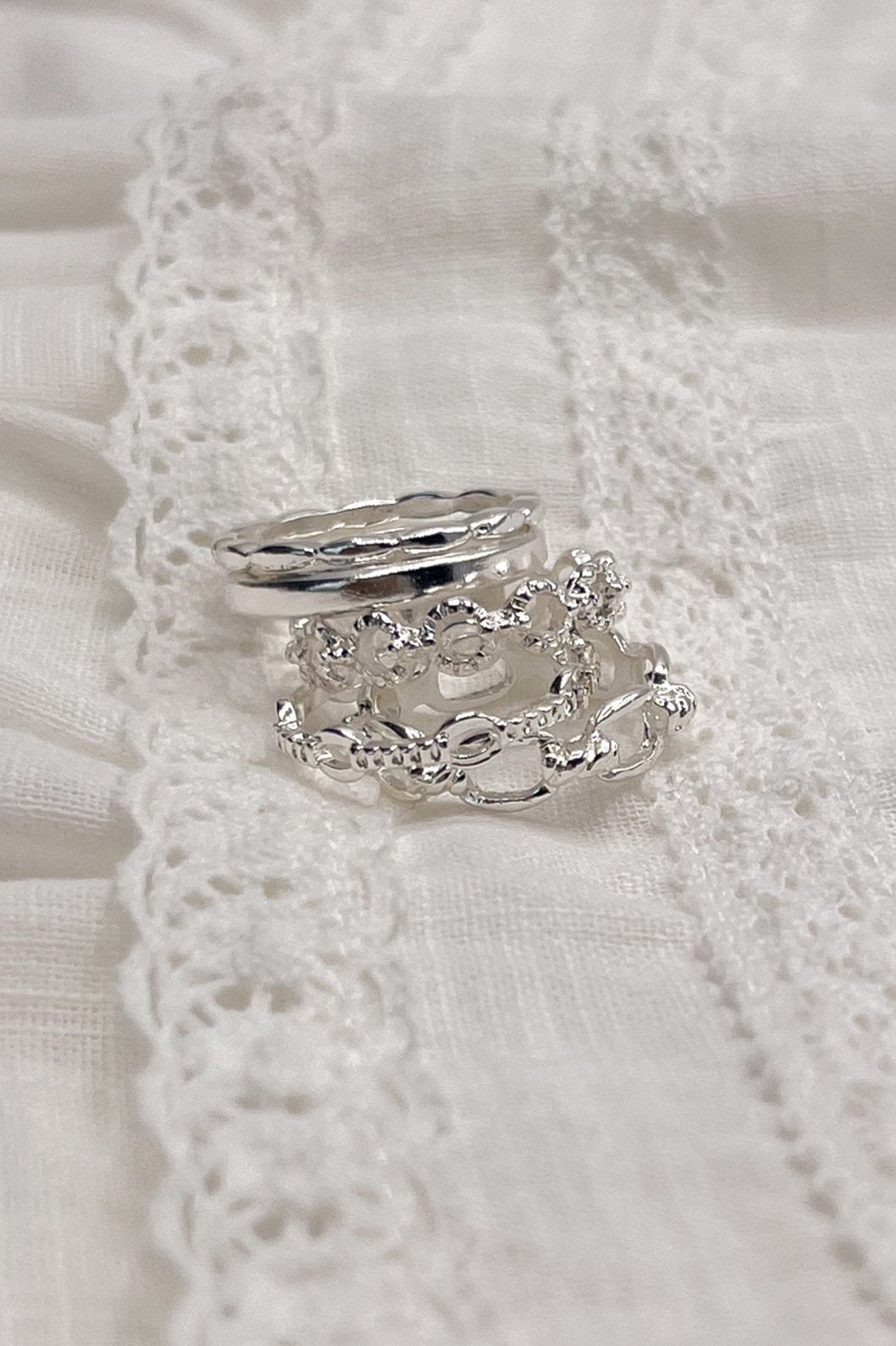 Image shows the Breanna Silver Chain Link Ring Set stacked against a white background.