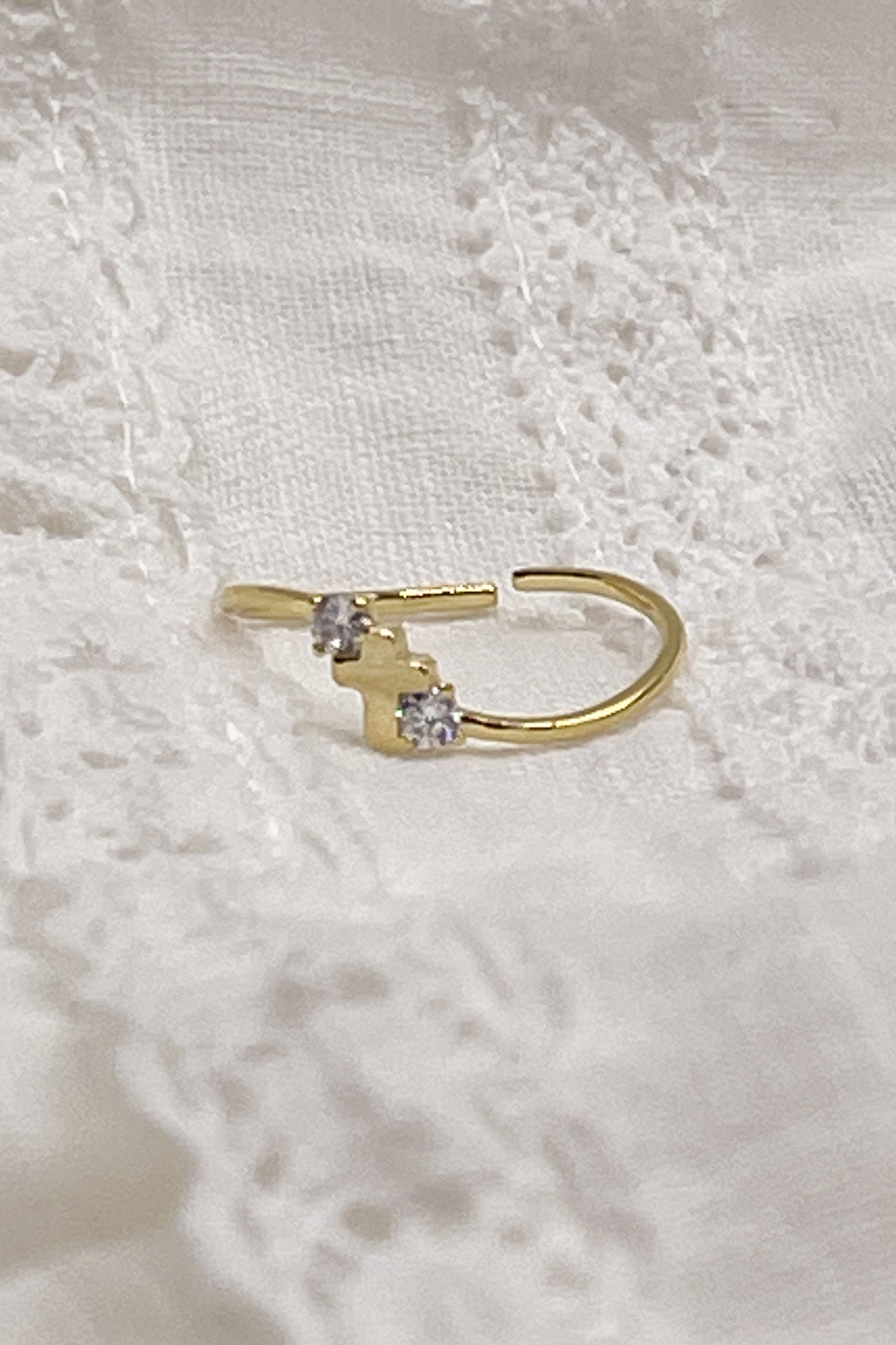 Image shows the Hensley Gold Cross Adjustable Ring against a white background.