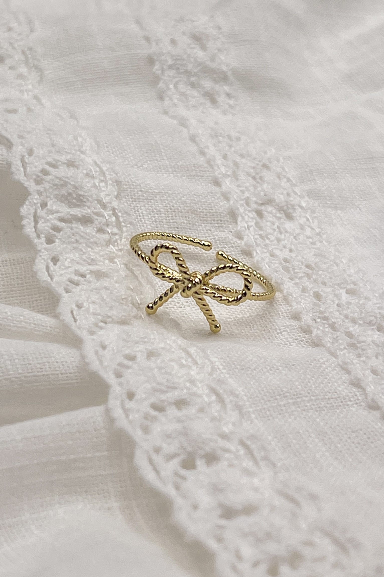 Image shows the Betty Gold Roped Ring against a white background.