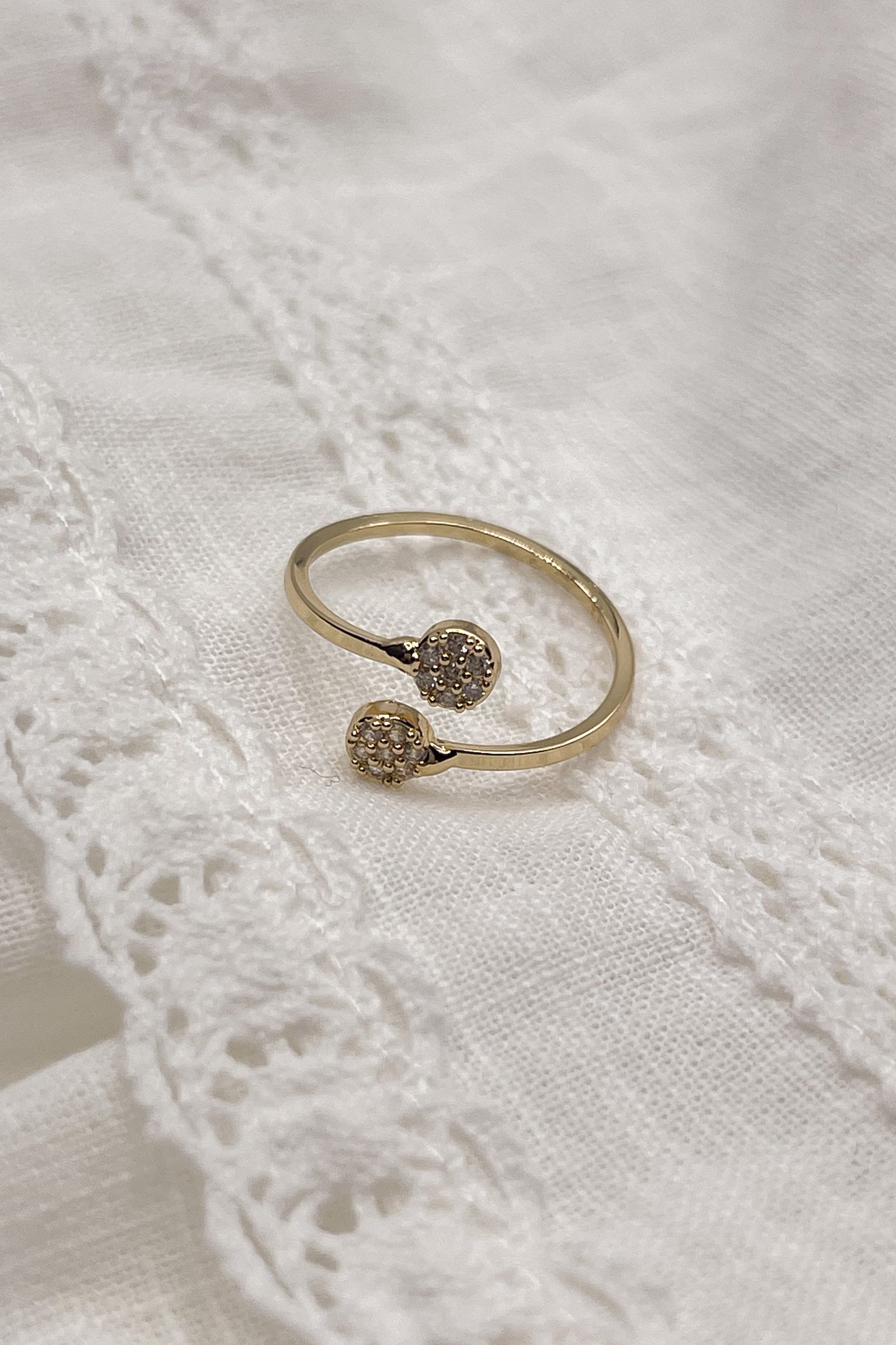 Image shows the Lina Gold & Rhinestone Ring against a white background.