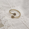 Image shows the Lina Gold & Rhinestone Ring against a white background.