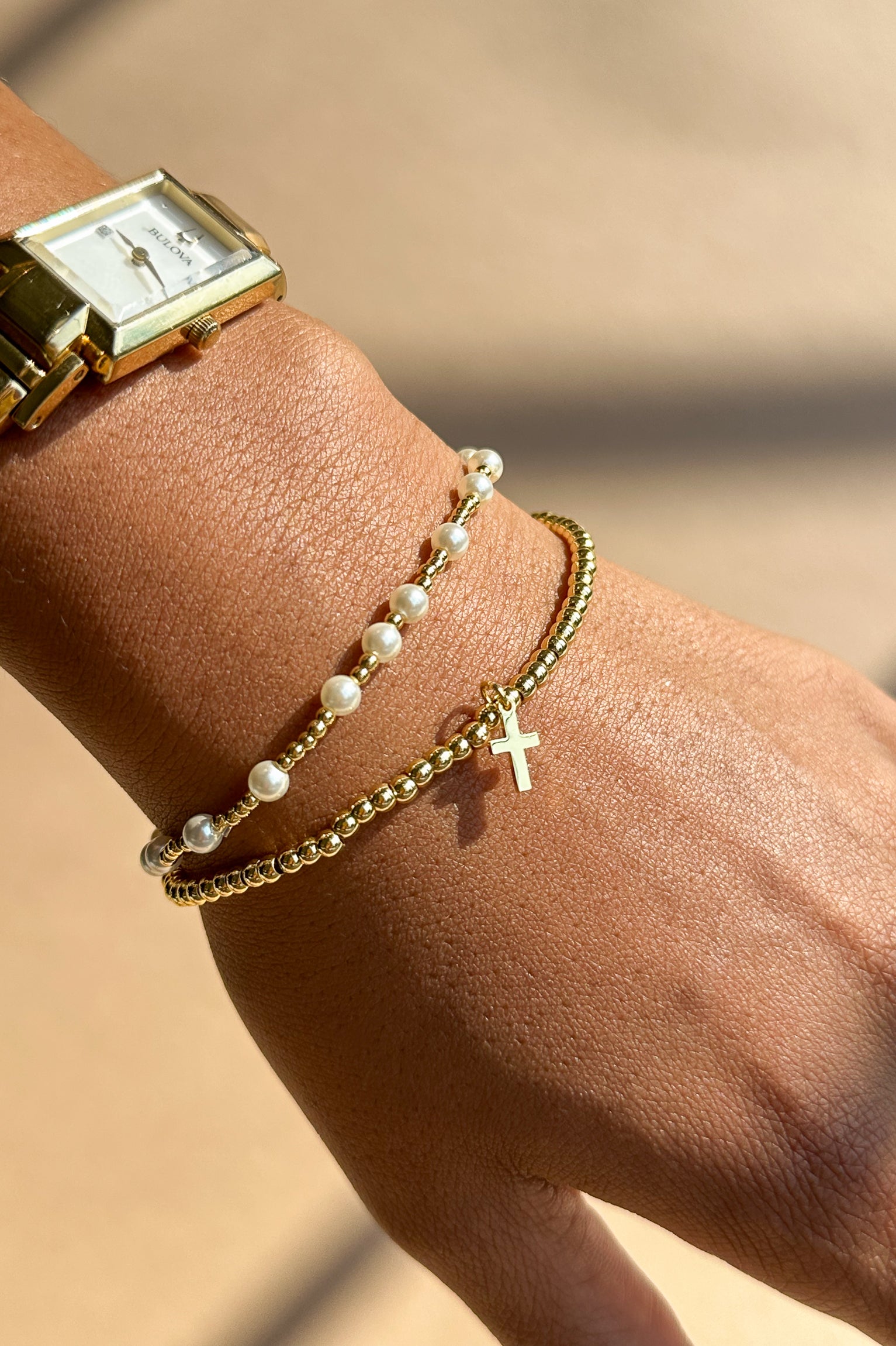 Laila Pearl & Gold Beaded Cross Bracelet Set- close up view