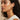 Brooklyn Gold Twisted Hoop Earrings - side view on model