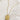 flat lay view of the Orion Sun Gold Necklace which features adjustable gold chain link with rectangle medallion. the medallion says "the sun" with a sun detail
