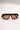 front view of the I-SEA: Royal Tortoise & Peach Polarized Sunglasses which features aviator shaped tortoise frames with peach polarized lenses