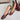 Mia Bali Burgundy Jelly Flats - side view on model