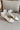 Dericia White Pearls & Bow Heel- front right side angle view