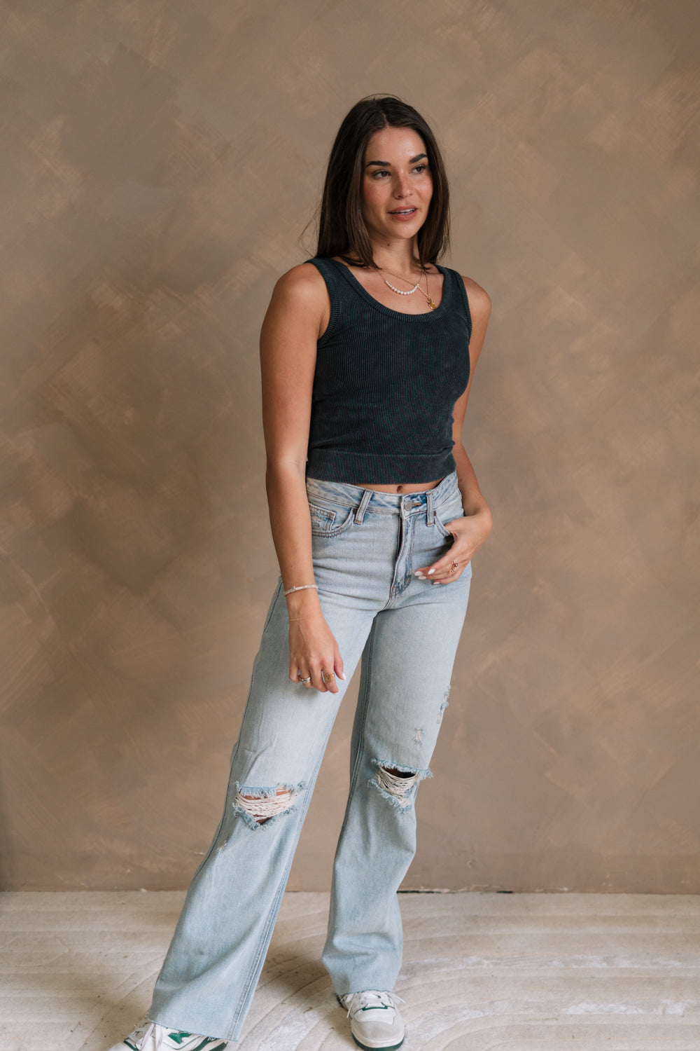 Front view of female model wearing the Kendall Ribbed Longline Brami in Black which features Ribbed Fabric, Washed Details, Longline Waist, Round Neckline, Thick Straps and Sleeveless.