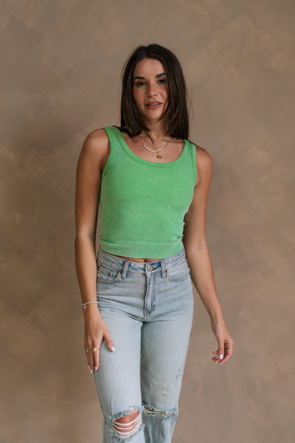 Front view of female model wearing the Kendall Ribbed Longline Brami in Green which features Ribbed Fabric, Washed Details, Longline Waist, Round Neckline, Thick Straps and Sleeveless.