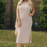 Full body view of female model wearing the Everly Light Taupe Ribbed Sleeveless Midi Dress which features Light Taupe Ribbed Fabric, Midi Length, Slit On The Side, Round Neckline and Sleeveless
